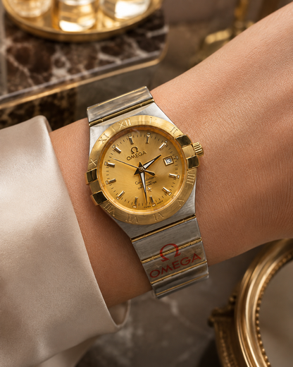 OMEGA CONSTELLATION DAMA BICOLOR DORADO CON CALENDARIO