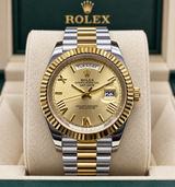 ROLEX DAY-DATE 40 MM – ESFERA DORADA, BISEL ESTRIADO Y BRAZALETE BICOLOR